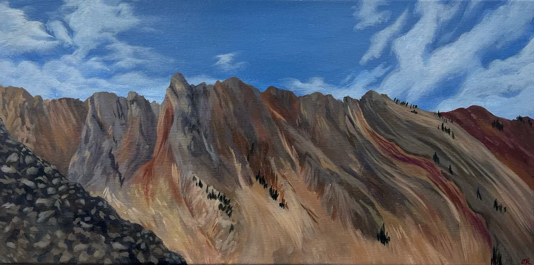 Painting of a rugged mountain range with reddish and beige rocky peaks under a blue sky with wispy white clouds.