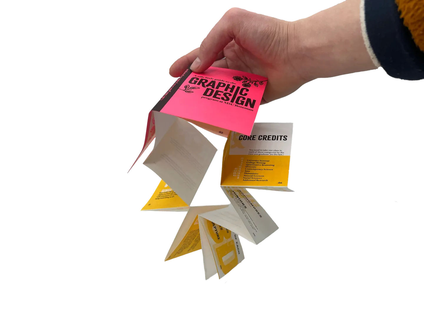 holding unfurled book