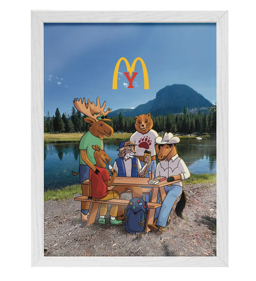 Illustration of anthropomorphic animals including a moose, bear, horse, and wolf gathered around a picnic table outdoors by a lake with mountains in the background and a stylized yellow 'M' with a red 'Y' above them.