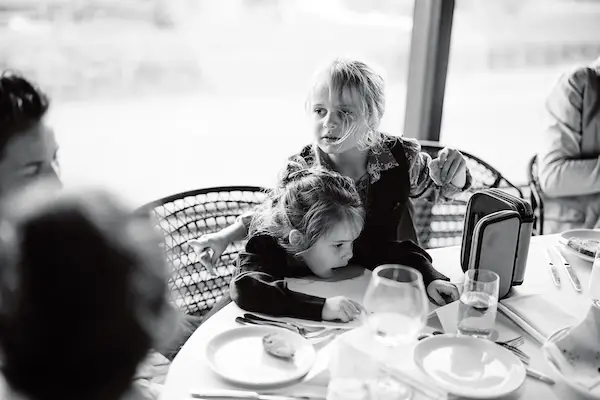 Laura and Rohan celebrating with their bridal party at the reception
