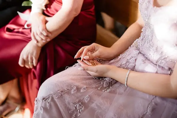 Laura and Bill walking together at their wedding venue