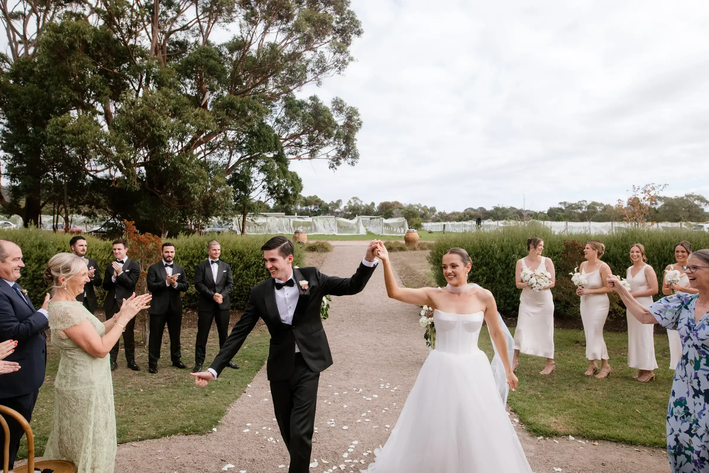 Cate and Luke celebrating with guests at their wedding