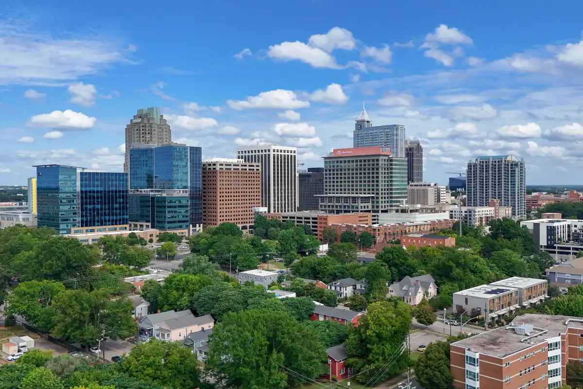 Downtown Raleigh, North Carolina, skyline rising above tree-lined residential streets