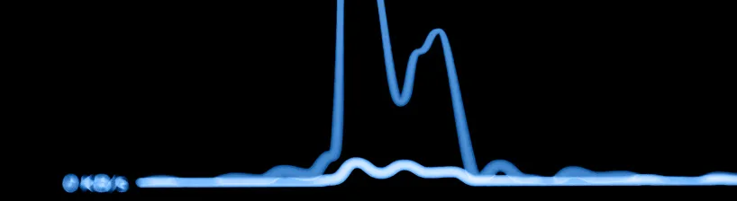 Blue waveform on black background with peaks and troughs resembling a signal or data graph.
