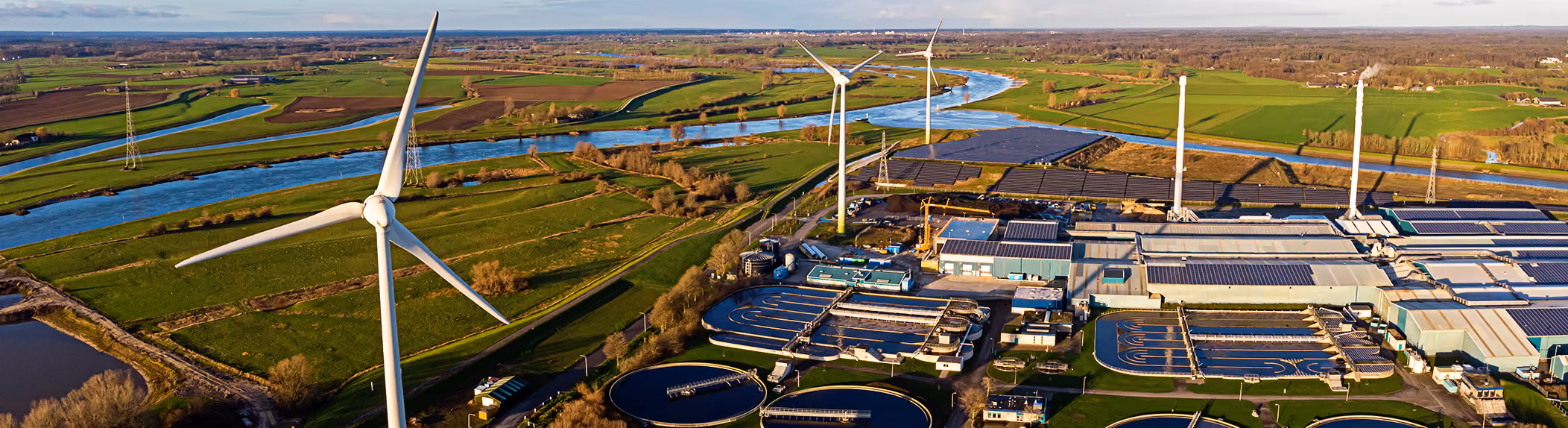 Wind turbines in an industrial yard