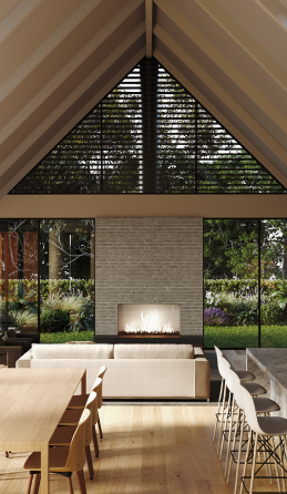 Modern living room with beige sofa facing a lit fireplace, large triangular window above, and floor-to-ceiling glass doors showing garden outside.