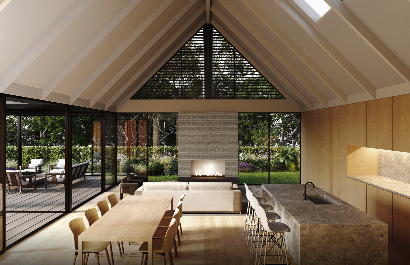 Modern open living space with vaulted ceiling, stone fireplace, wooden dining table, kitchen island with bar stools, and large windows overlooking a garden patio.