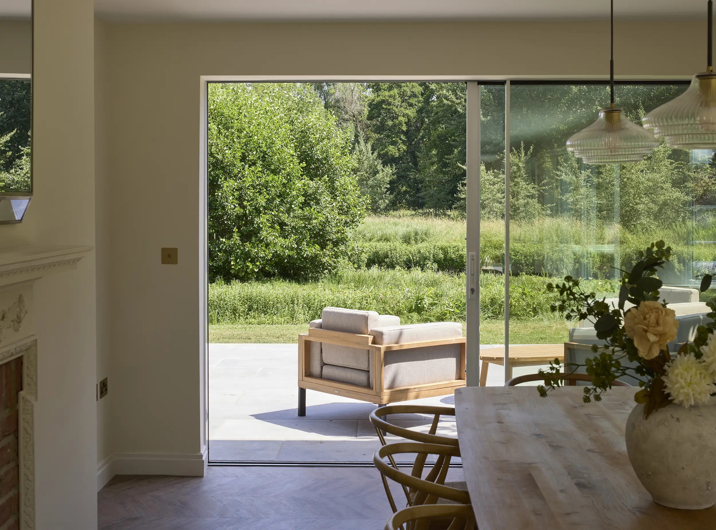 Dining area and patio view at Kimbridge House on the Test Valley