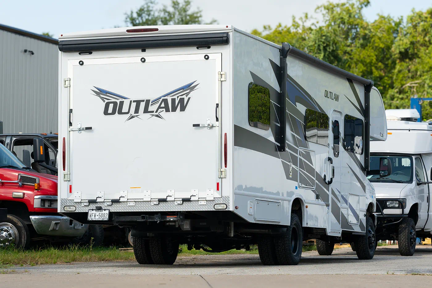 2025 Ford E-450 Thor Outlaw Class C motorhome with WeldTec 6" Off Grid lift kit and King Shocks installed by Adrenaline Offroad Co. in Tomball TX near Houston