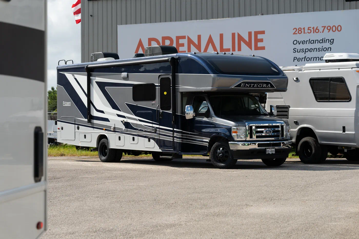 2024 Entegra Esteem Ford E450 Class C motorhome with WeldTec 2" Getaway lift kit at Adrenaline Offroad Co. Tomball TX — overlanding suspension shop serving Houston