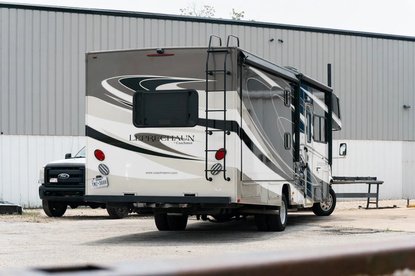 2015 Coachmen Leprechaun Ford E450 Class C motorhome with WeldTec 2" Getaway suspension lift kit at Adrenaline Offroad Co. Tomball TX near Houston