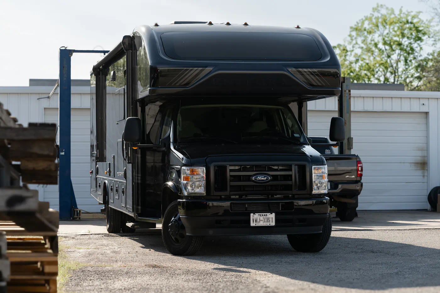 2025 Entegra 29T Ford E450 Class C motorhome with WeldTec 4" Adventurer lift kit and progressive leaf springs installed by Adrenaline Offroad Co. Tomball TX