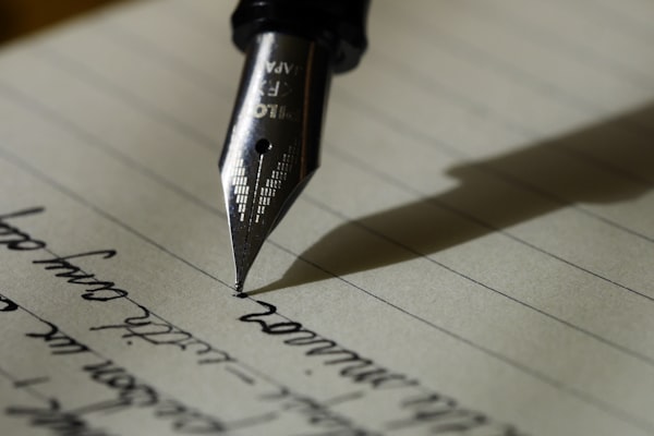 Writing SEO blog content on laptop