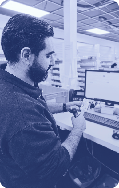 Pharmacist counting pills