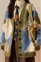 A person in a sweater with flowers in her pocketAI-generated content may be incorrect.