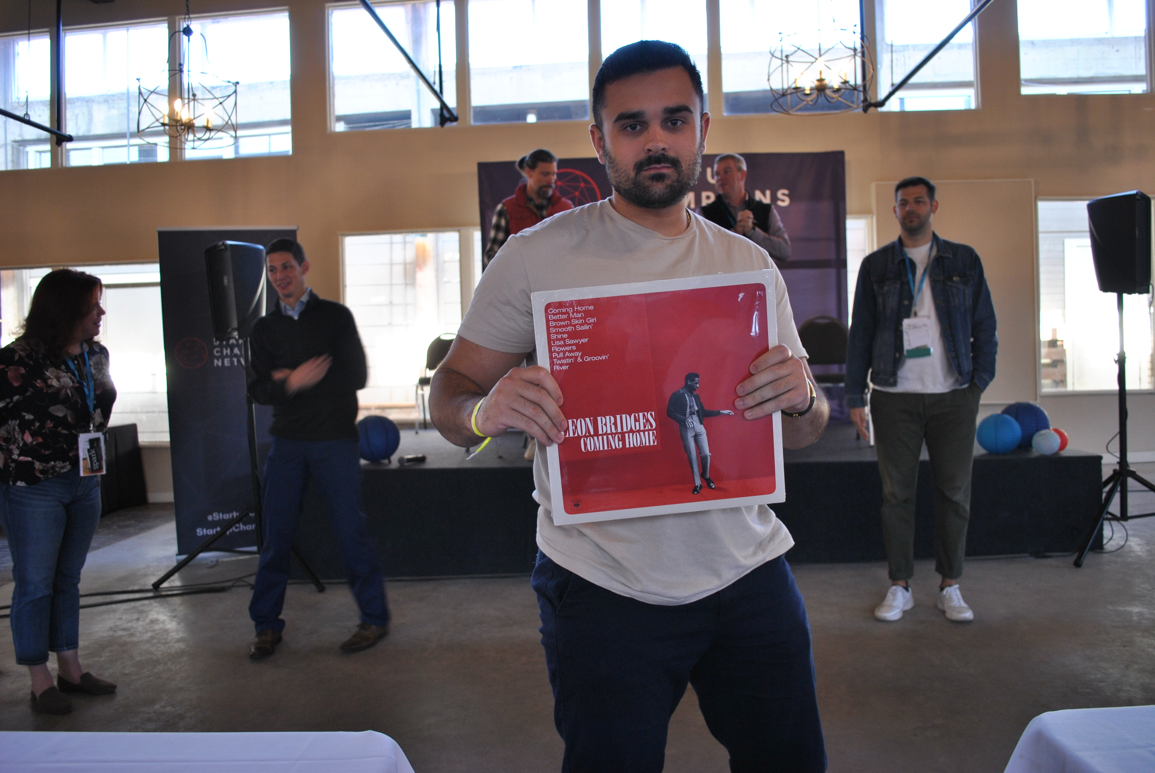 EcoMap team member Eddie Micklovic showing a lot of emotion after winning a Leon Bridges album on vinyl