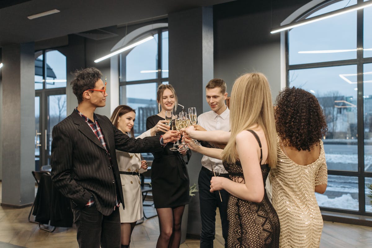 A bunch of employees all hanging out at a corporate gathering