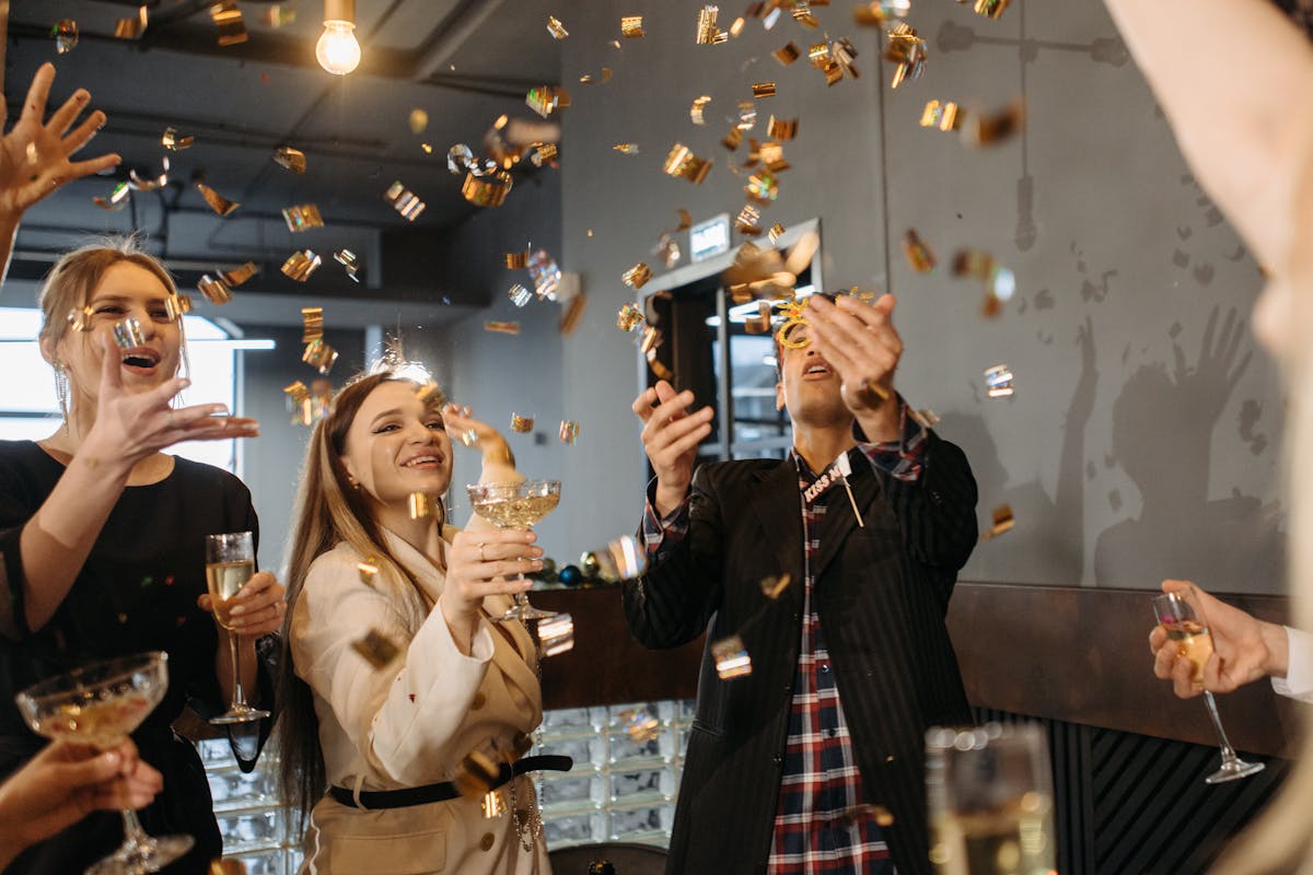 A bunch of people celebrating in a room