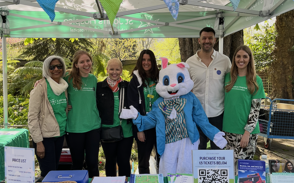 A white cartoon bunny underneath the words 'Easter Egg-Stravaganza'.