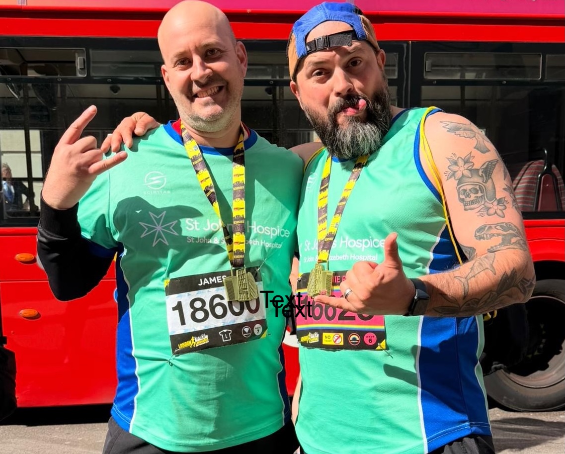James and Steve, posing for camera at running event