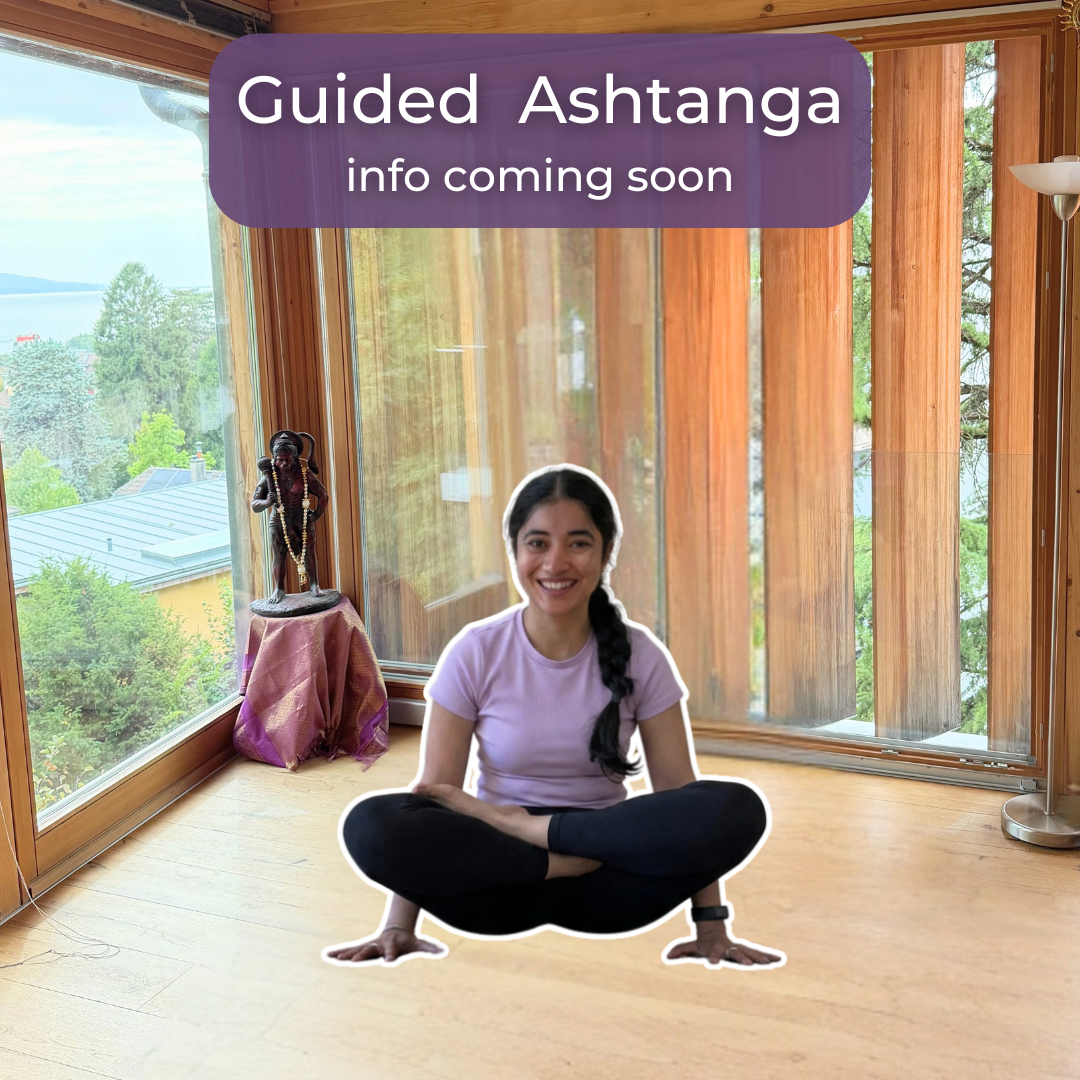 Man in a purple tank top doing a boat pose on a purple yoga mat in a spacious wooden studio.