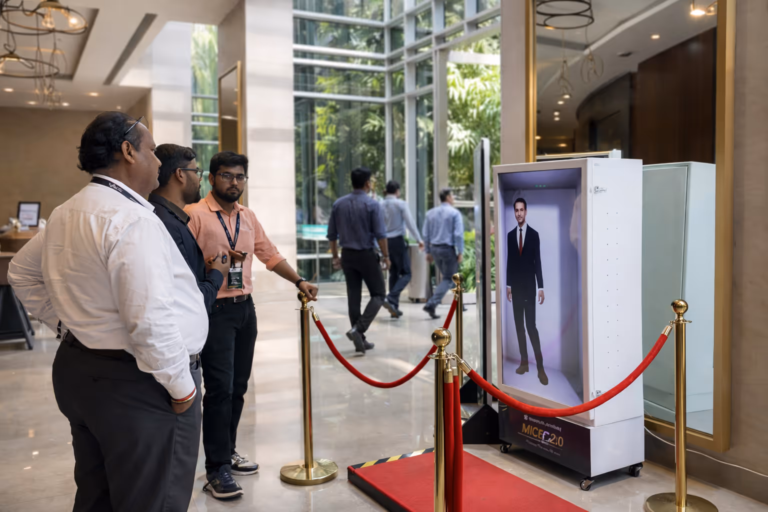 HoloBox AI holographic display at Maruti Suzuki MQFC 2.0 — life-sized hologram engaging dealership representatives