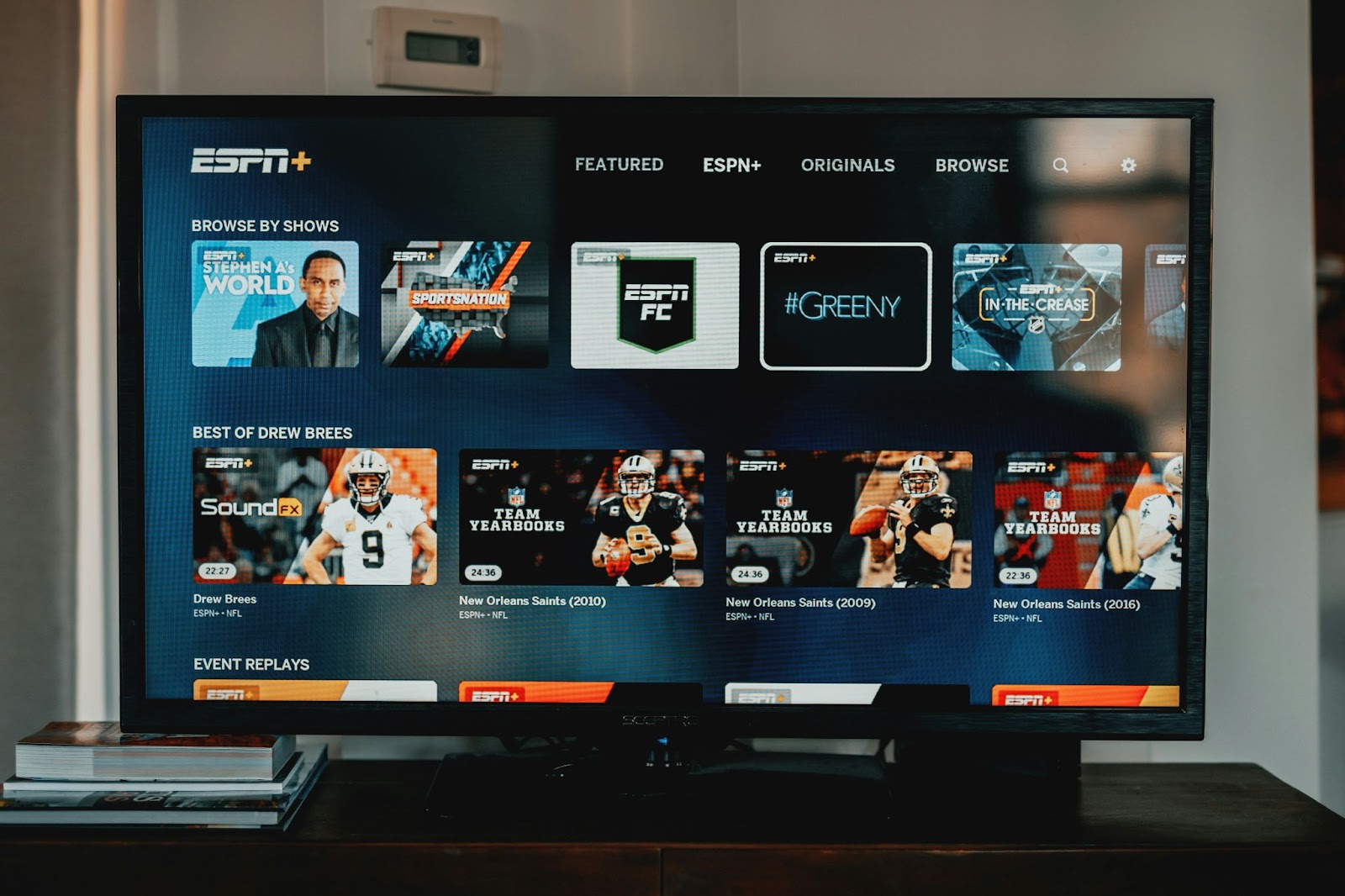 A photo of a TV displaying the ESPN Plus home screen