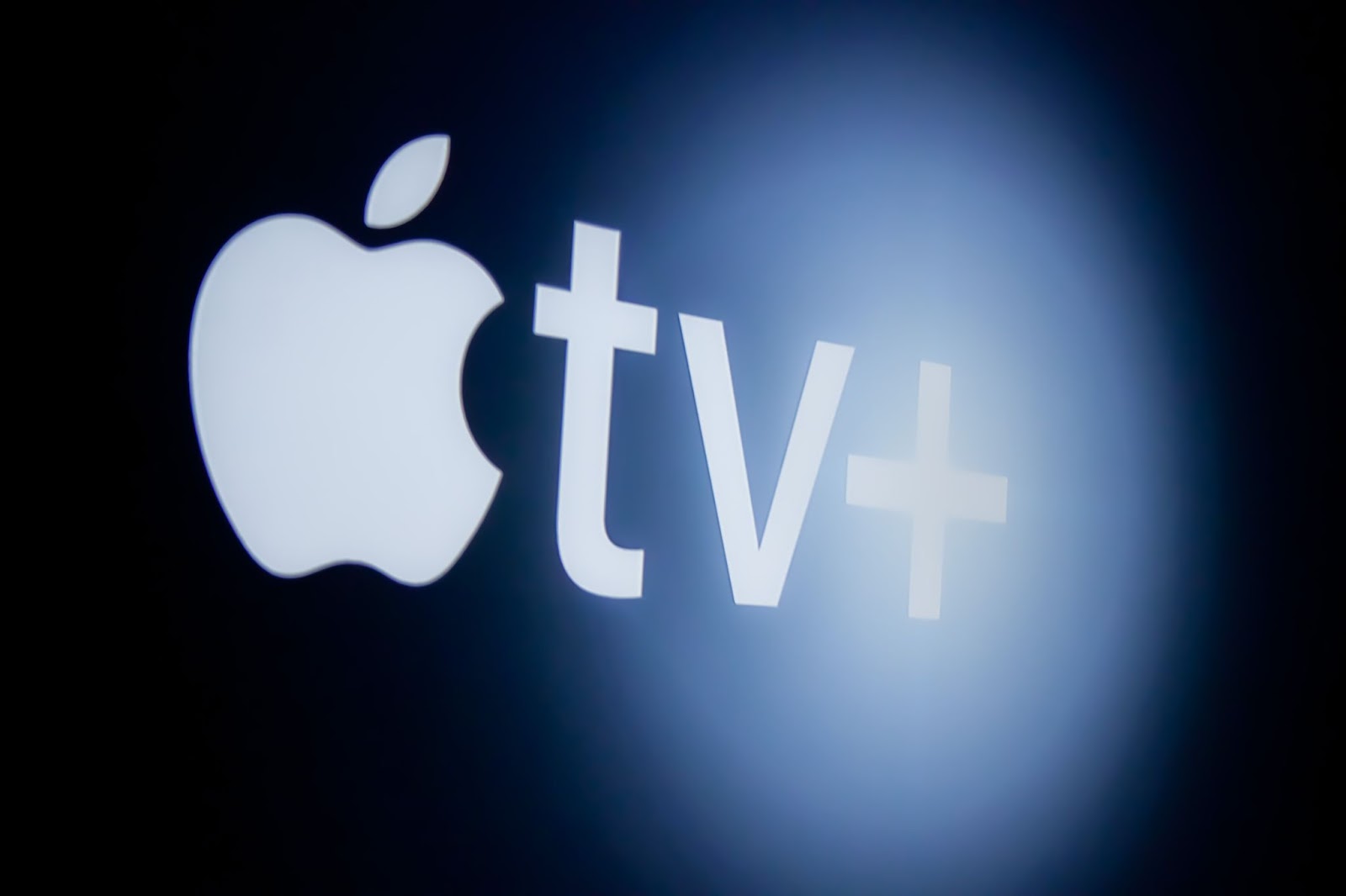 A close-up photo of Apple TV Plus’s logo on a screen