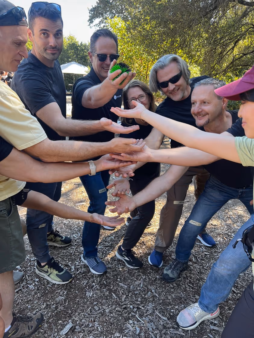 A group of people participating in an ice breaker.