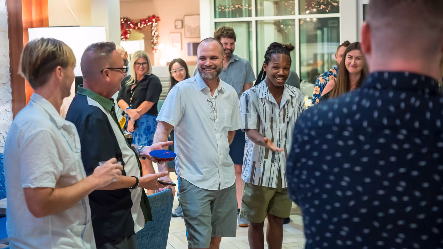 An image of people talking at a party