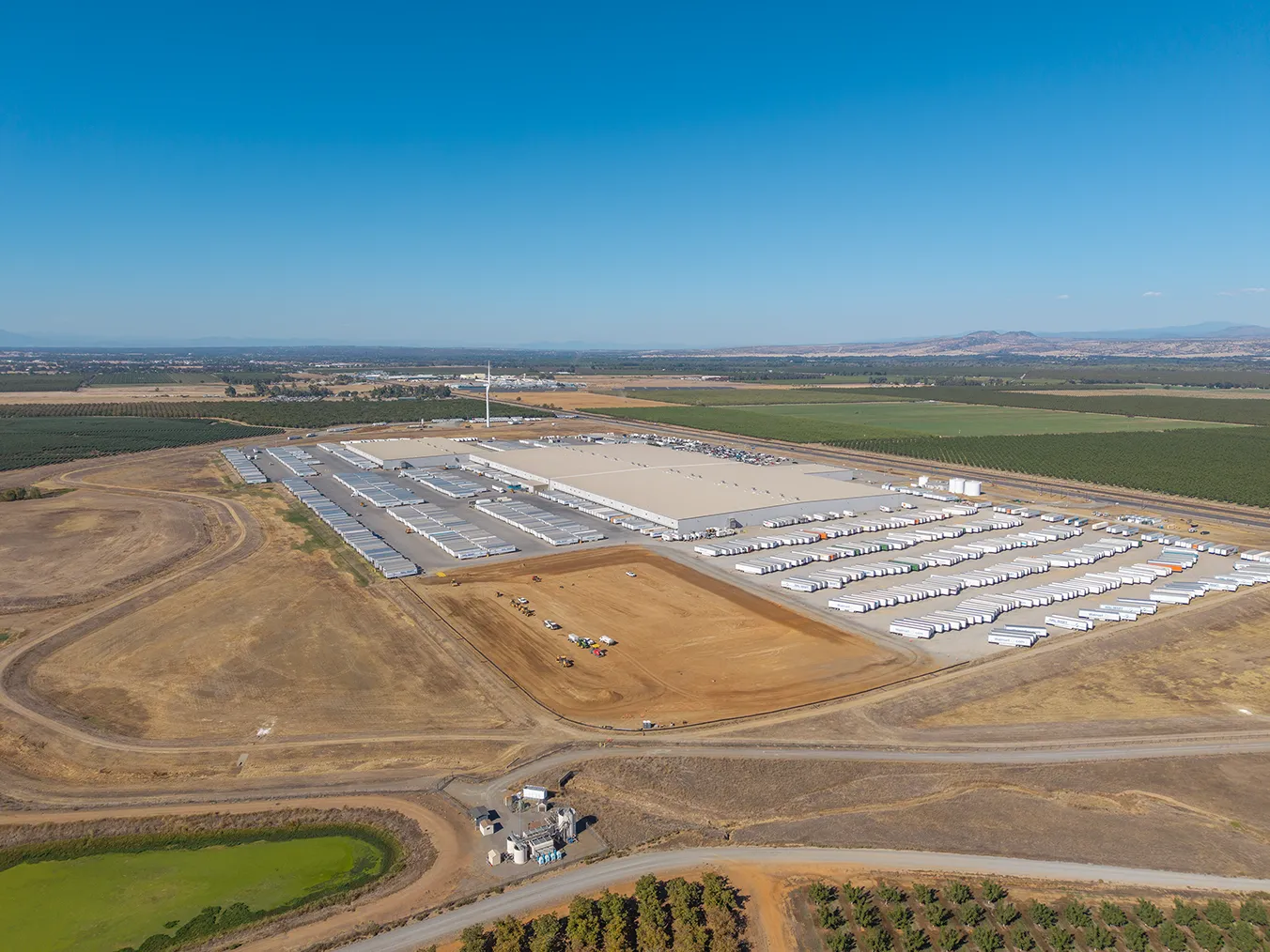 Aerial view of the Red Bluff Distribution Center during a large-scale exterior lighting and underground electrical infrastructure project.