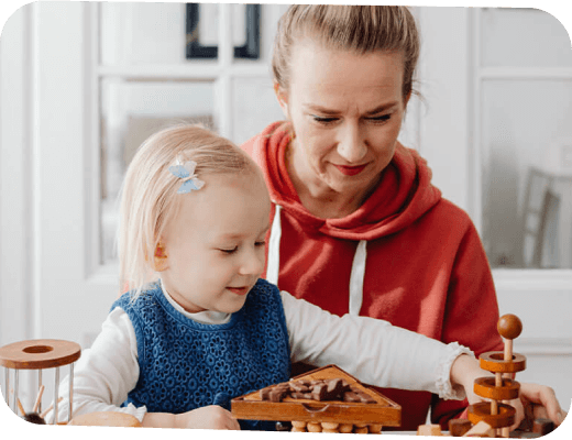 Woman and child playing