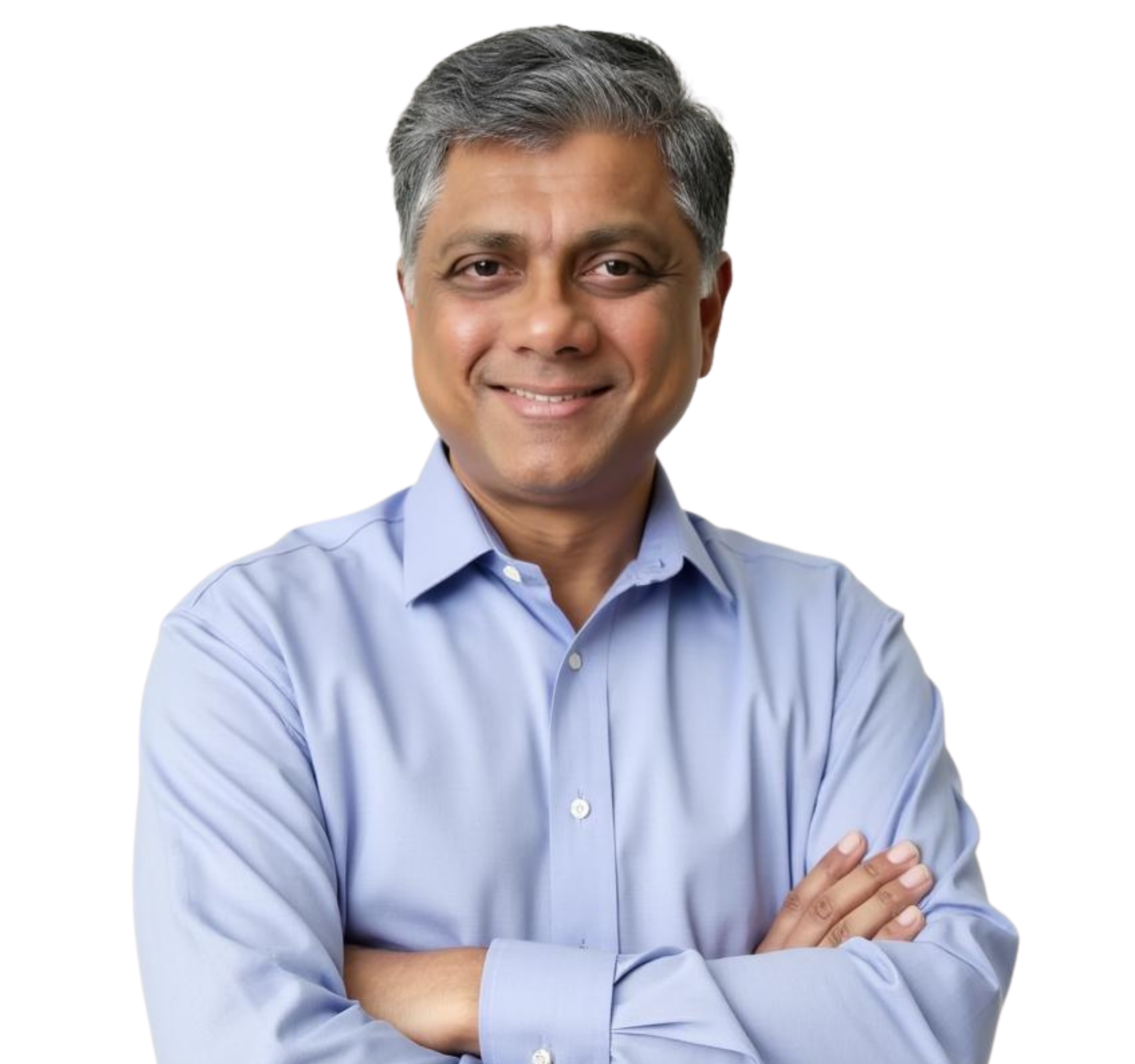 Smiling man with gray-streaked hair wearing a blue button-up shirt against a white abstract background.