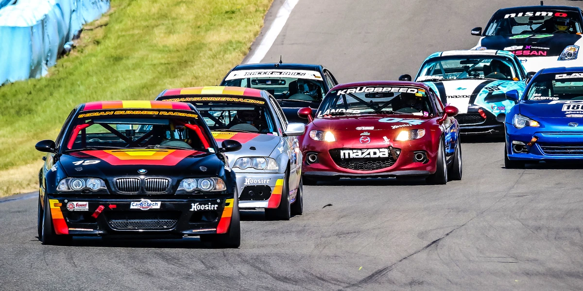 Man working on trailer and motorhome