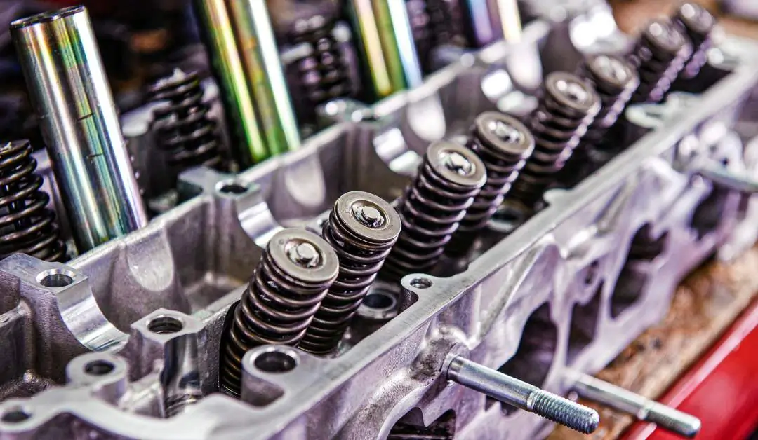 A picture of an engine block being assembled.