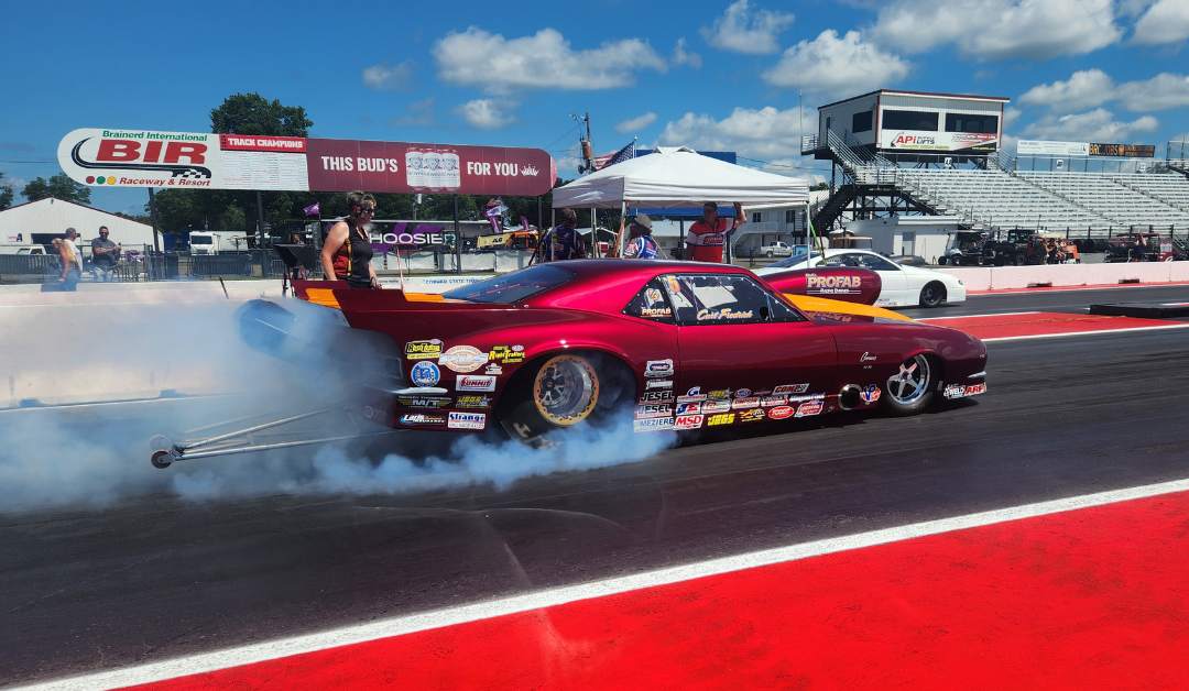 Man working on trailer and motorhome