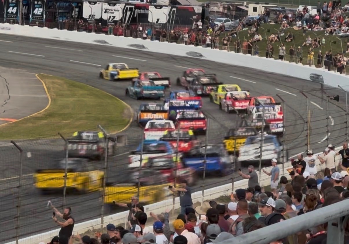 Top Fuel dragsters under tent
