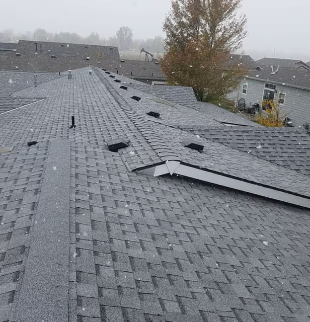 An image of asphalt shingles roof