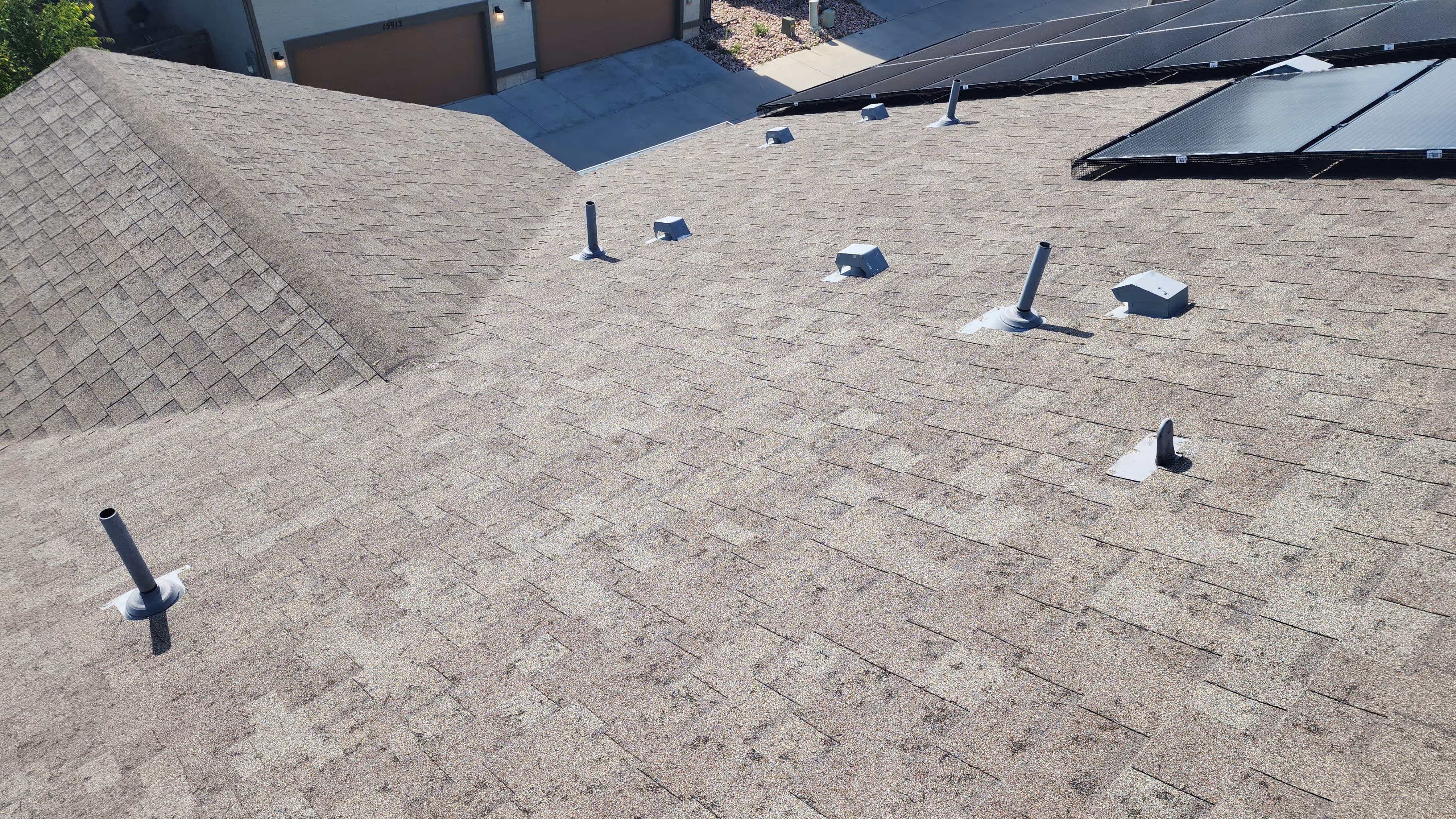 Asphalt roof installed by Gorilla Roofing