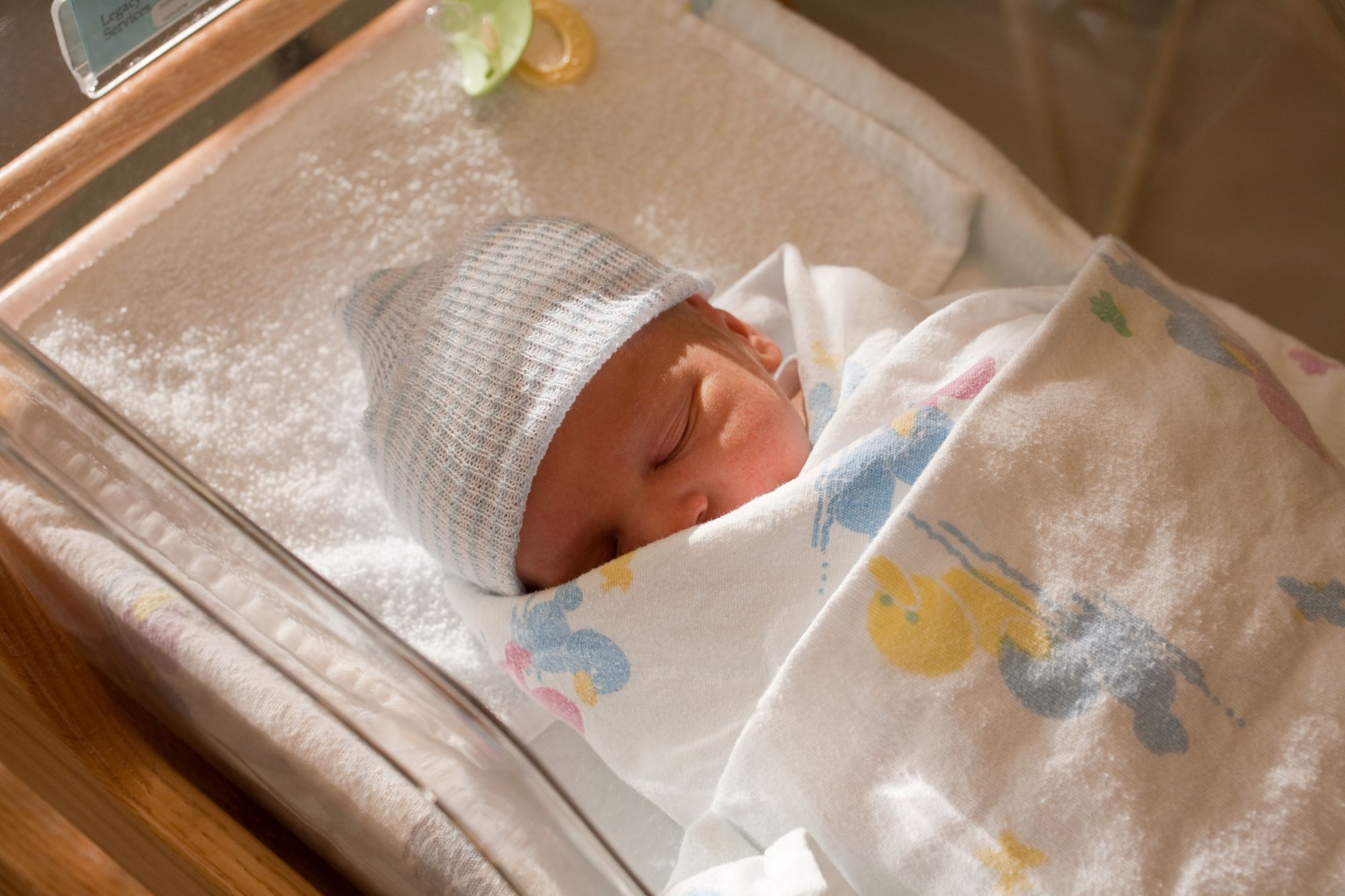 An image of a newborn baby sleeping