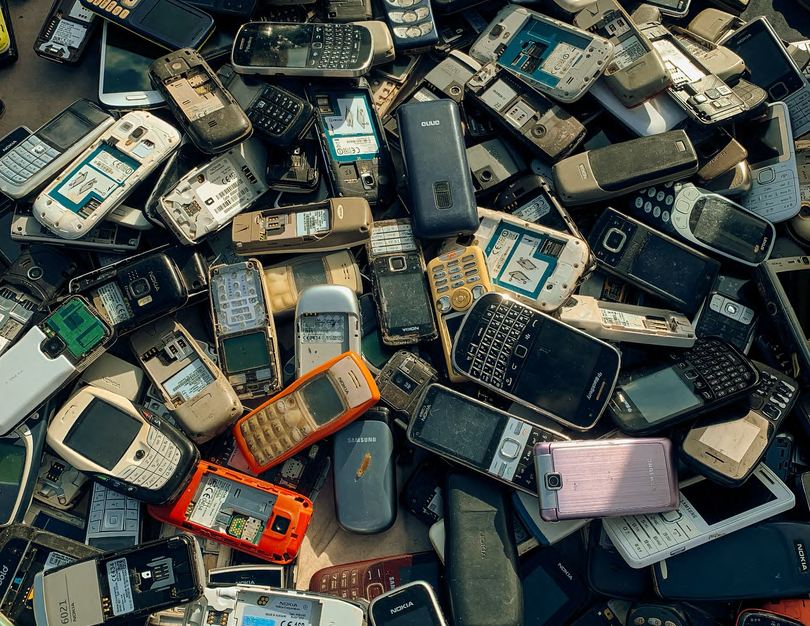 Collected e-waste devices awaiting refurbishment