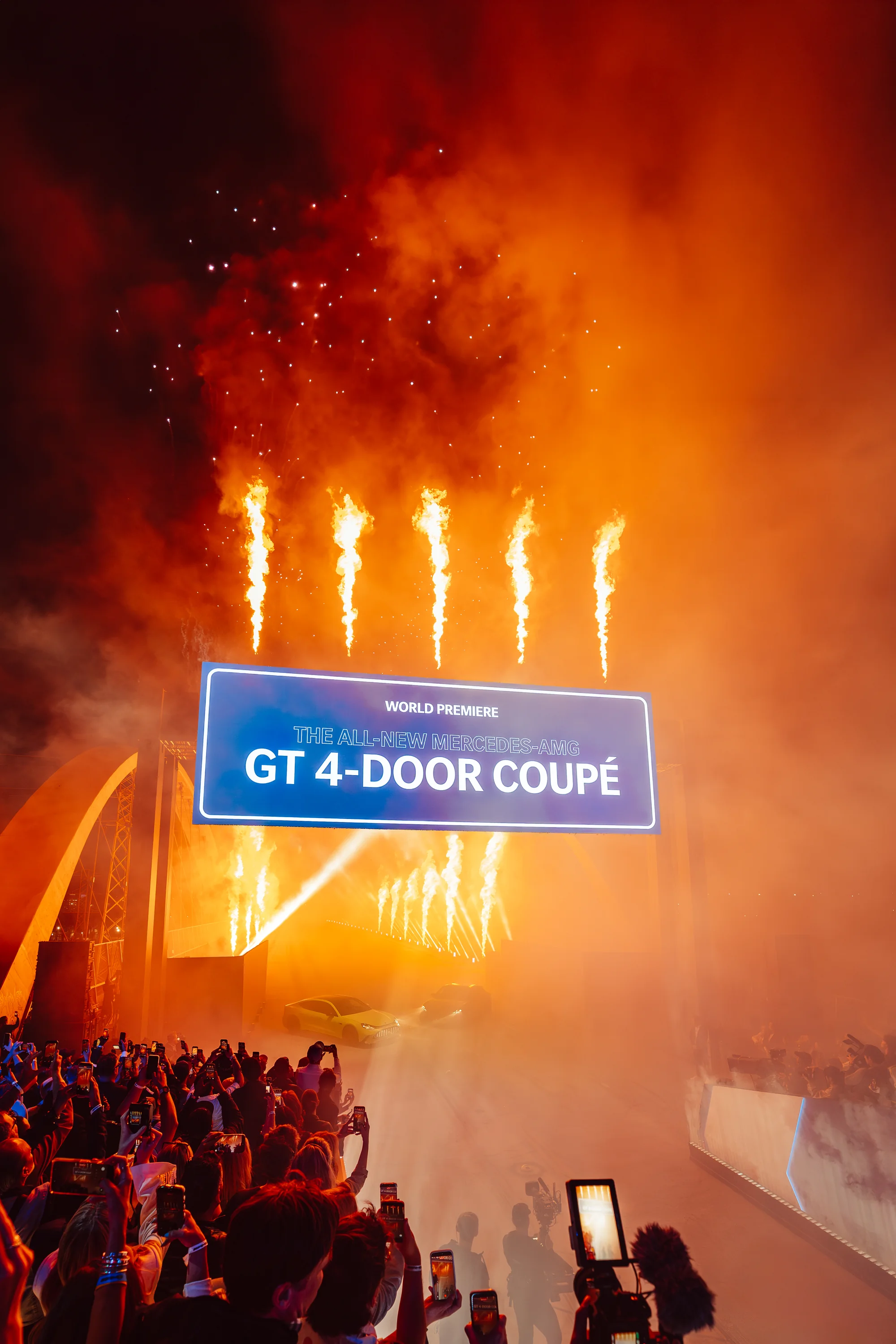 Pyrotechnics and flames above the Mercedes-AMG GT 4-Door Coupé world premiere sign on the Sixth Street Bridge in Los Angeles