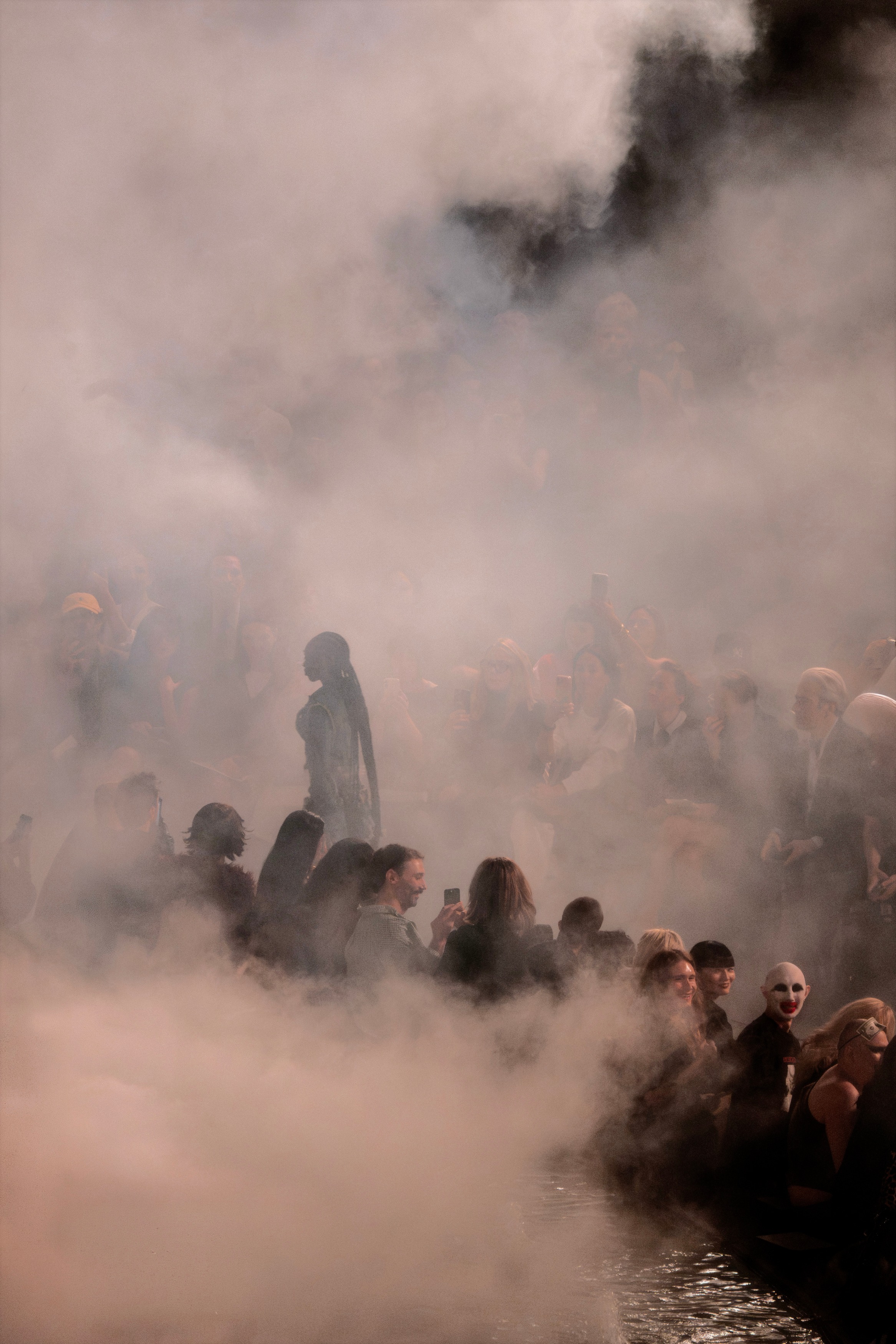 Model in the fog at Place de la République — © Ophélie Maurus