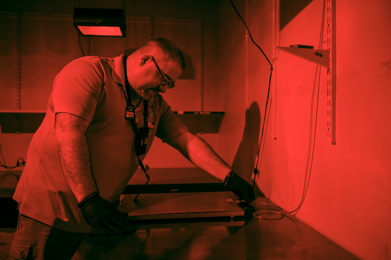 Phoenix employee evaluating a neutron image