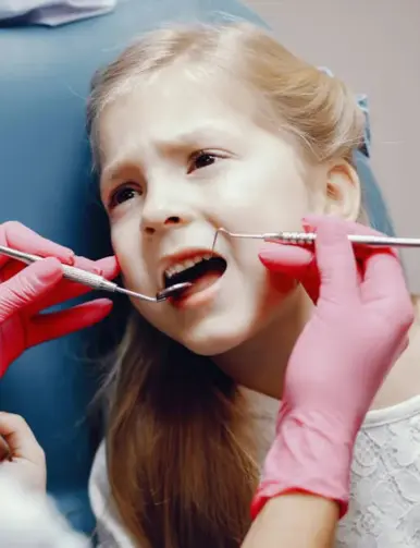 Child receiving same-day pulpectomy consultation at Glow Pediatric Dentistry Pflugerville