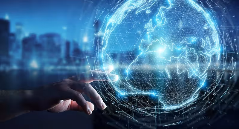 Manager considering expansion possibilities with virtual globe