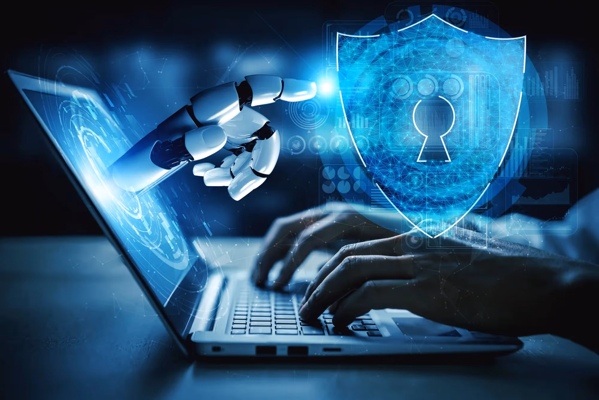 cybersecurity automation visualised as a robot hand coming from a laptop