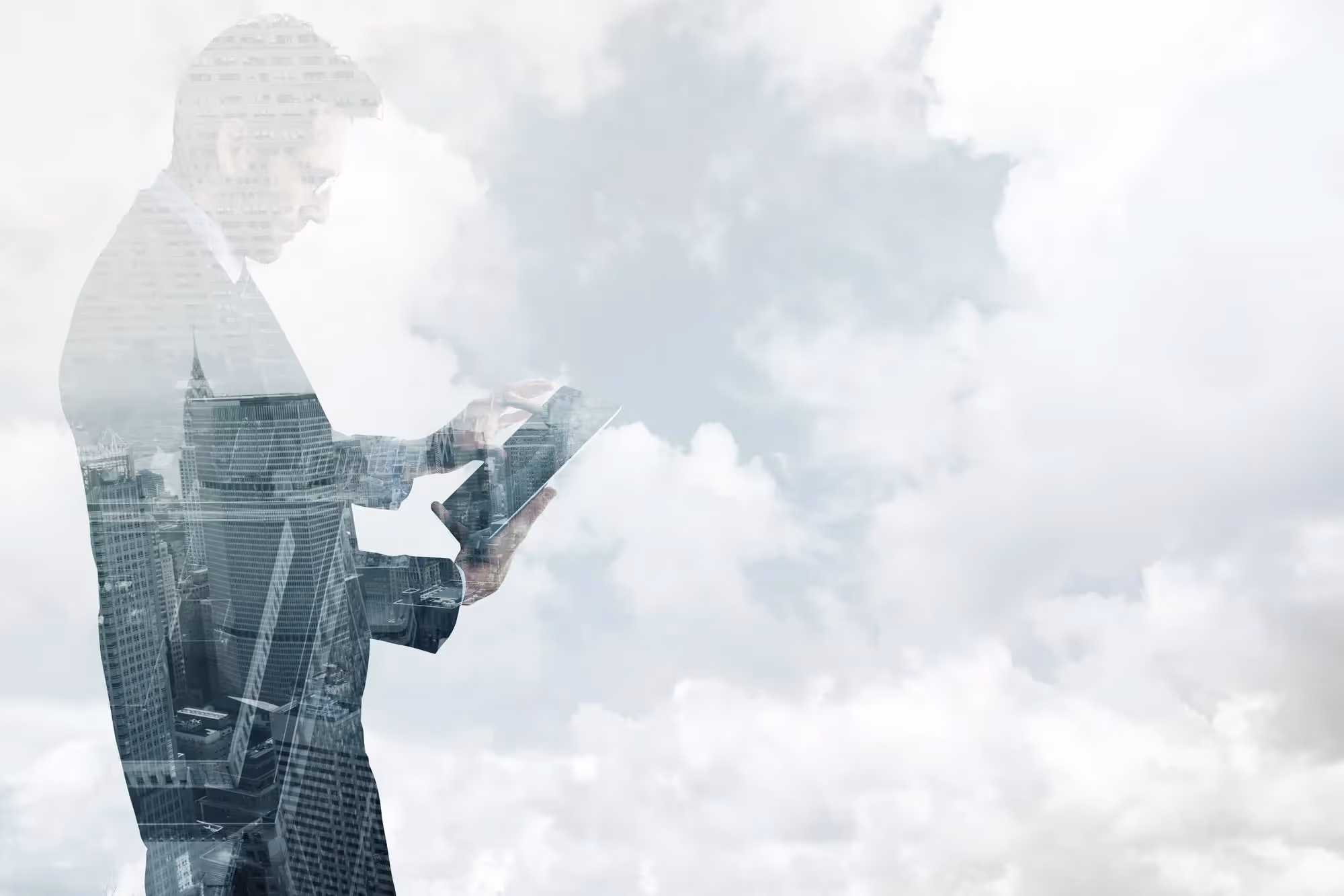 businesses person with a smart device in front of clouded sky