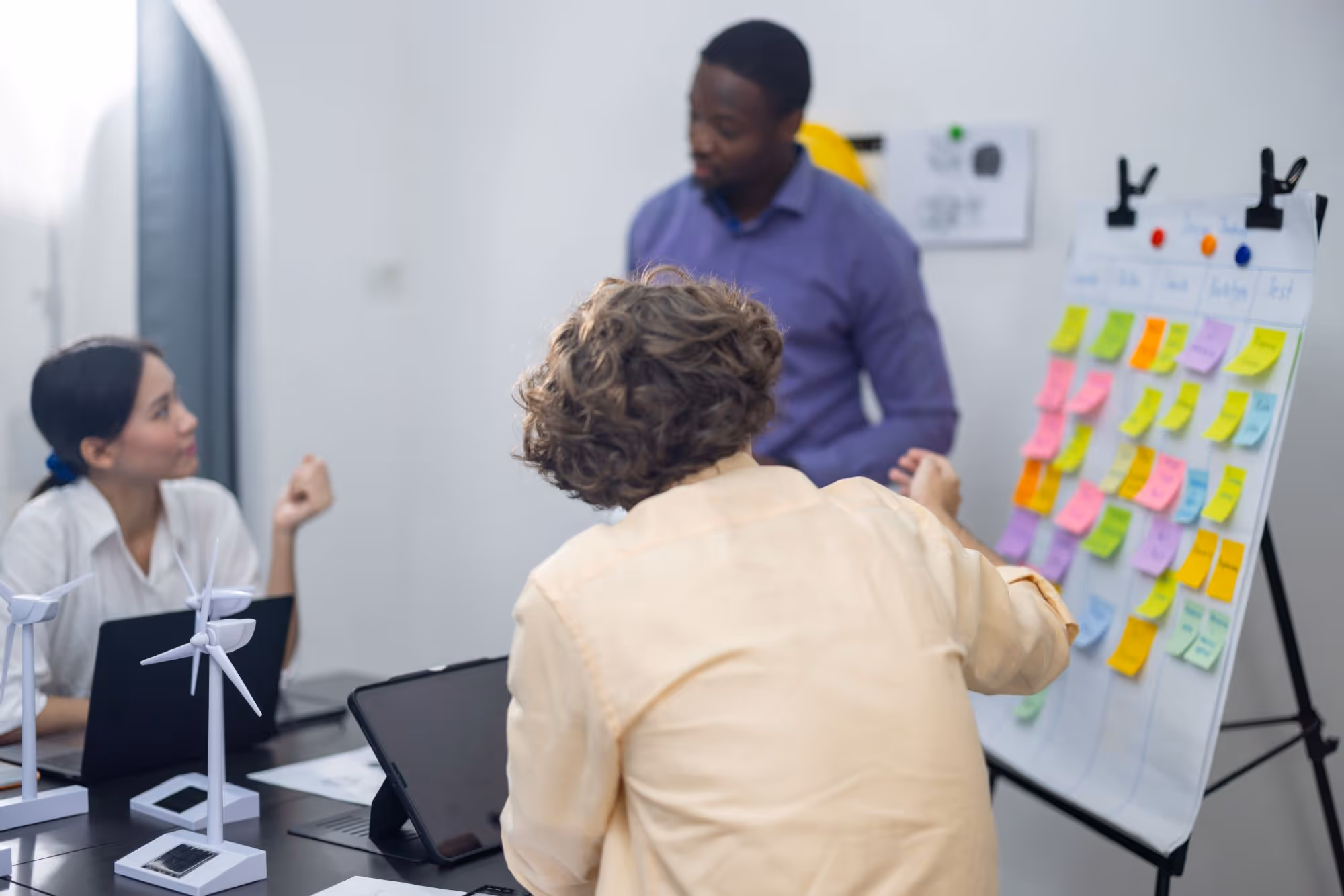 Consultants discussing various customer engagement strategies.