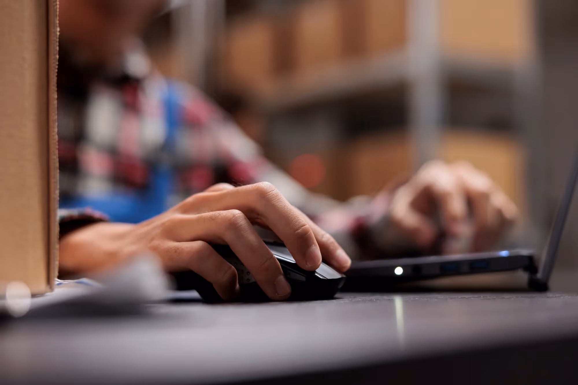 Logistics worker utilizes AI-backed software solution at work